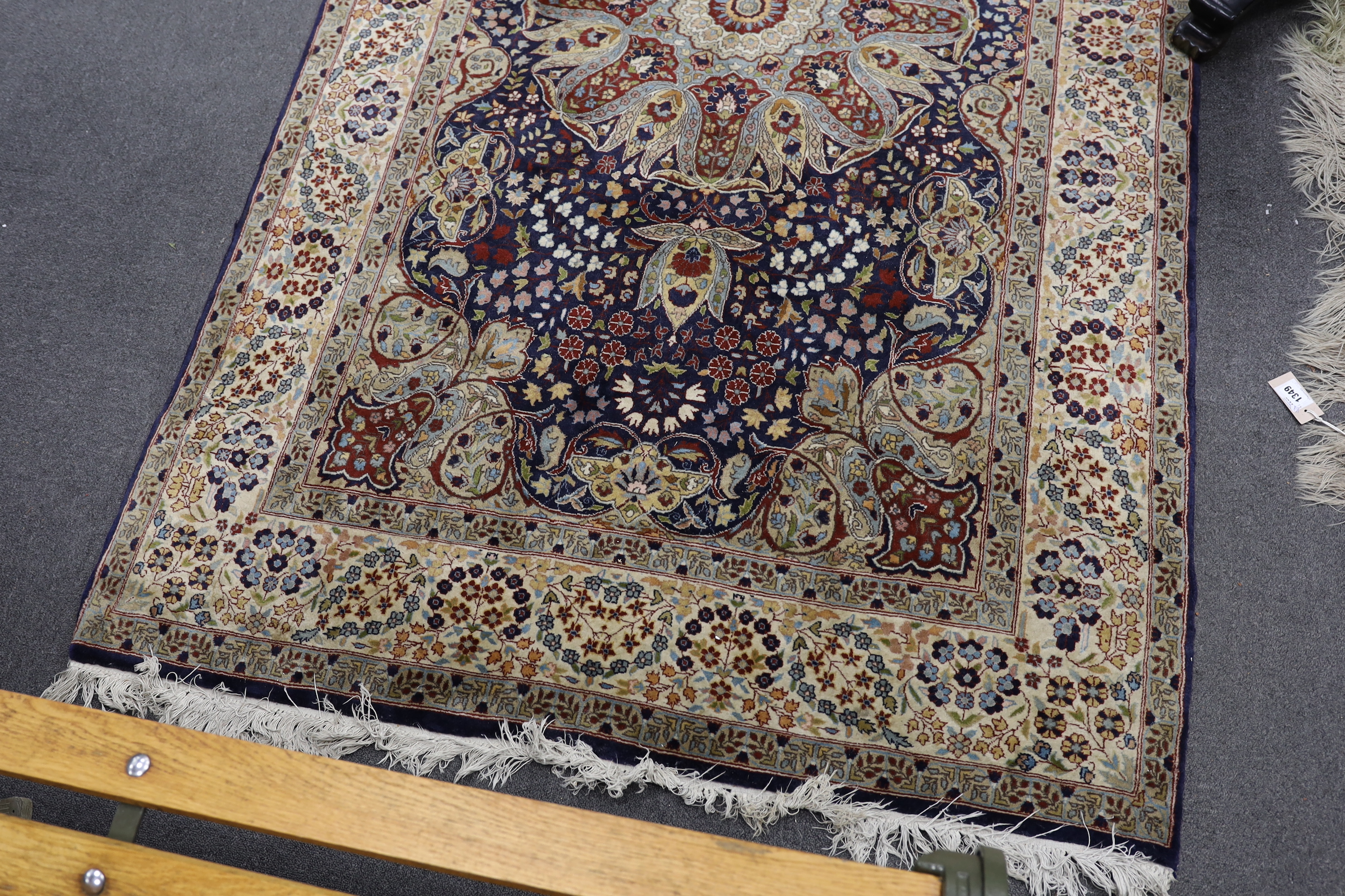 A North West Persian blue ground rug, 240 x 140cm